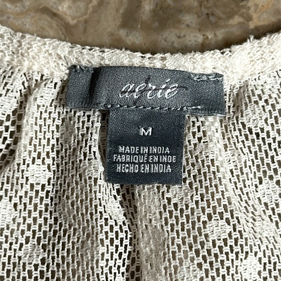 Aerie cream,sheer,cap flutter sleeve,cotton blend,tassels
Boho,feminine,romantic - Picture 8 of 13